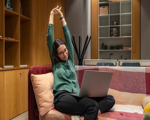 Woman practicing gentle yoga at home for flexibility